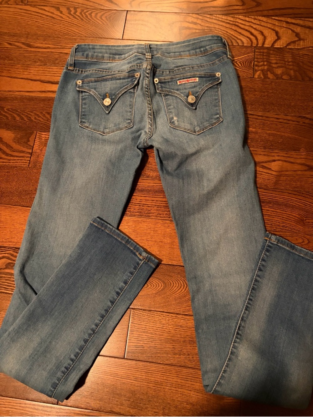 Light Blue Women's Jeans with Button-Accent Back Pockets